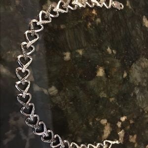 Sterling silver and diamond heart tennis bracelet